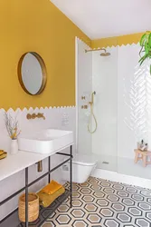 Yellow tiles in the bathroom photo design