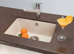 Sink Built Into The Countertop For The Kitchen Photo