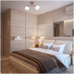Inexpensive bedroom interior in light colors