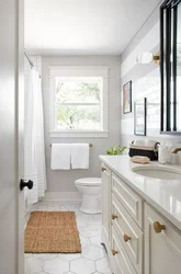 Design Of A Bathroom With A Toilet In The House With A Window