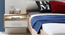 Дизайн подвесной тумбы в спальне