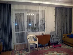Нитяные шторы в интерьере гостиной