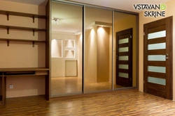 Sliding wardrobes in the hallway corridor in the interior