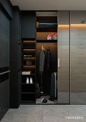 Sliding wardrobes in the hallway corridor in the interior