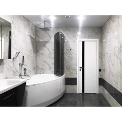 Bathroom design with black floor