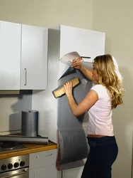 Kitchen covered with film photo