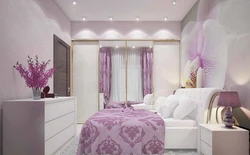 Pink wallpaper in the bedroom interior