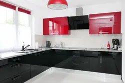 Red and black kitchen in the interior photo