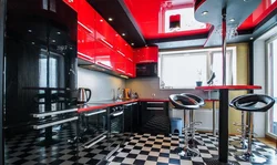 Red and black kitchen in the interior photo