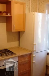 Kitchen design 5 sq.m. with refrigerator and geyser