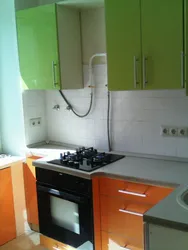 Kitchen design 5 sq.m. with refrigerator and geyser