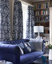 What Are The Blue Sofa Curtains In The Living Room Interior?