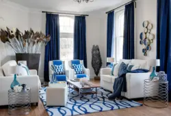 What are the blue sofa curtains in the living room interior?