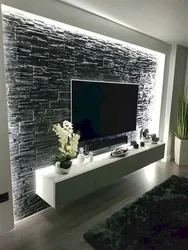 Decorate a wall in the living room with a TV in a modern style photo