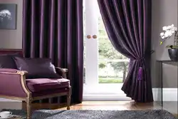 Purple curtains in the living room interior