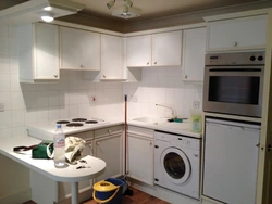Photo of a 6 m kitchen with a washing machine