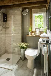 Interior of a bathroom with shower in a wooden house