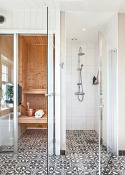 Interior Of A Bathroom With Shower In A Wooden House