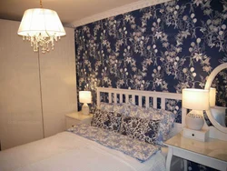 Bedroom design with combined wallpaper in a modern style