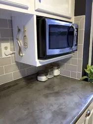 Photo of a place for a microwave in the kitchen photo