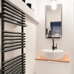 Heated Towel Rail In The Bathroom Photo