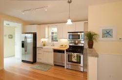 Kitchen With Gold Refrigerator Photo