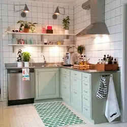 Kitchens without upper cabinets with pencil case and refrigerator photo