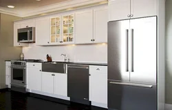 Photo of a linear kitchen with a refrigerator