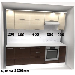 Photo of a linear kitchen with a refrigerator