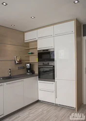 Photo Of A Linear Kitchen With A Refrigerator