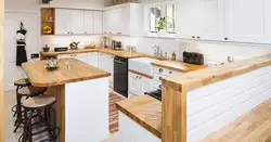 Photo of a kitchen with a wood-colored countertop