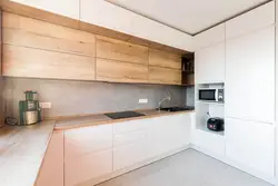 Photo of a kitchen with a wood-colored countertop