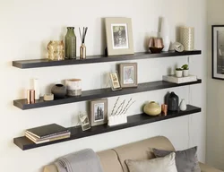 Wall shelves in the living room interior