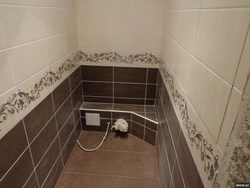 Tiles with border in the bathroom photo