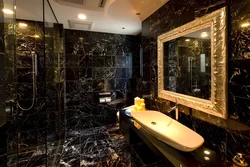 Black marble tiles in the bathroom photo design