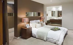 Bedroom design with dressing room behind the bed