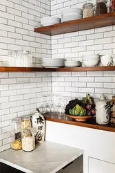 Corner shelves in the kitchen interior