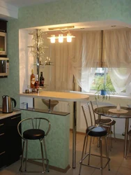 Кухня с барным столом у окна фото