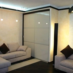 Living room interior with built-in wardrobe photo