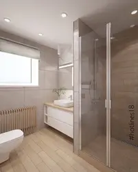 Терезесі бар үйде душ кабинасы бар ванна мен дәретхананың дизайны