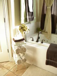 В ванной комнате полотенца дизайн