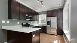 Wallpaper for the kitchen with a dark set of interior design