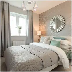 Beige bed in a gray bedroom photo