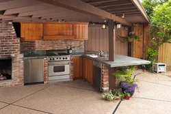 Summer kitchen in the country with a barbecue grill photo