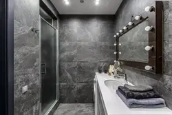 Bath with toilet in gray photo