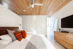 Bedroom with wooden ceiling photo