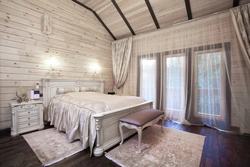 Bedroom with clapboard inside photo