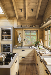 Kitchen Design In A Wooden House Photo