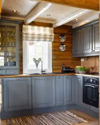 Kitchen design in a wooden house photo
