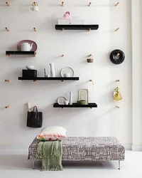 Modern shelves on the wall in the bedroom photo